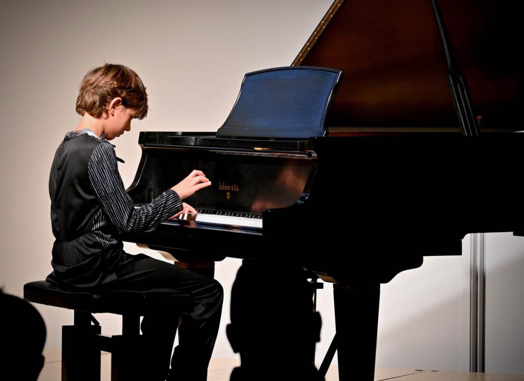 student-playing-piano
